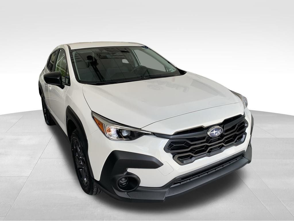 2026 Subaru CROSSTREK Base in Crystal White Pearl — front three-quarter view