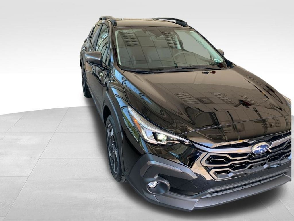 2026 Subaru CROSSTREK Limited in Crystal Black Silica — front three-quarter view