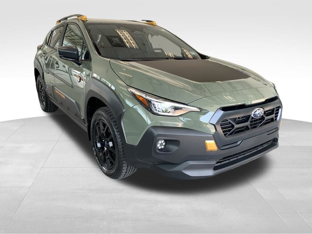2026 Subaru CROSSTREK Wilderness in Alpine Green — front three-quarter view