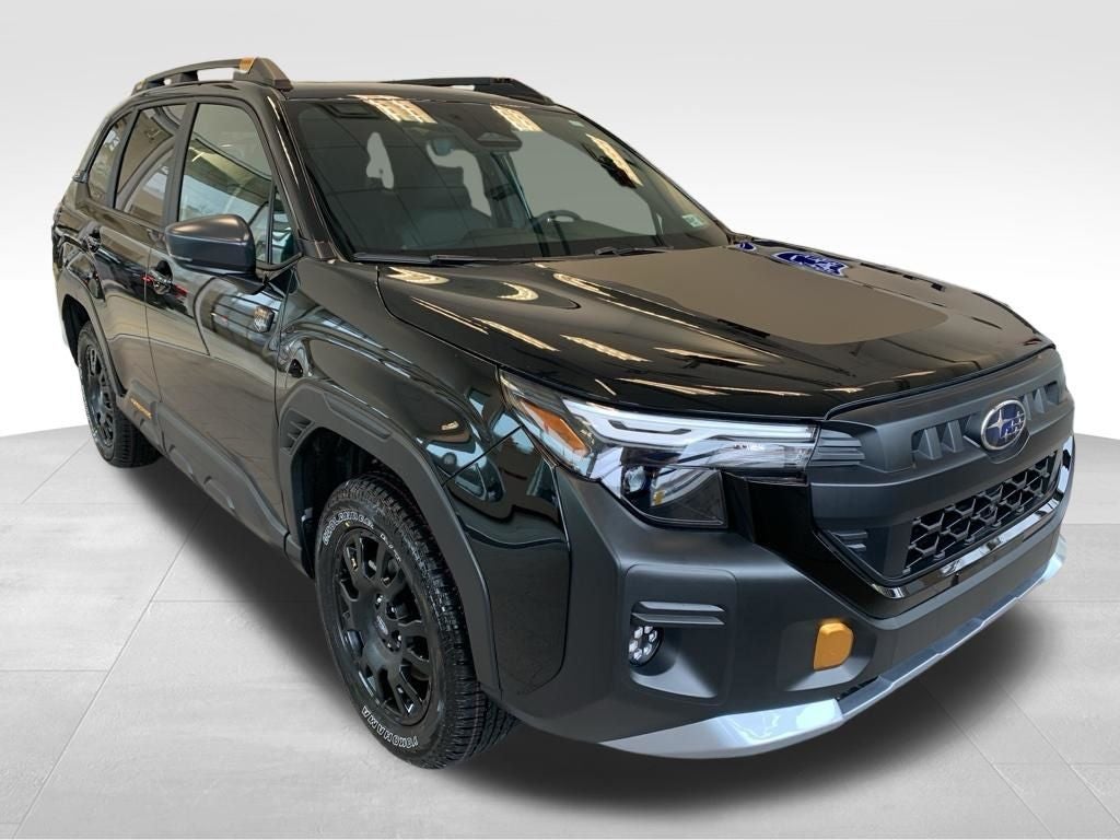 2026 Subaru FORESTER Wilderness in Crystal Black Silica — front three-quarter view