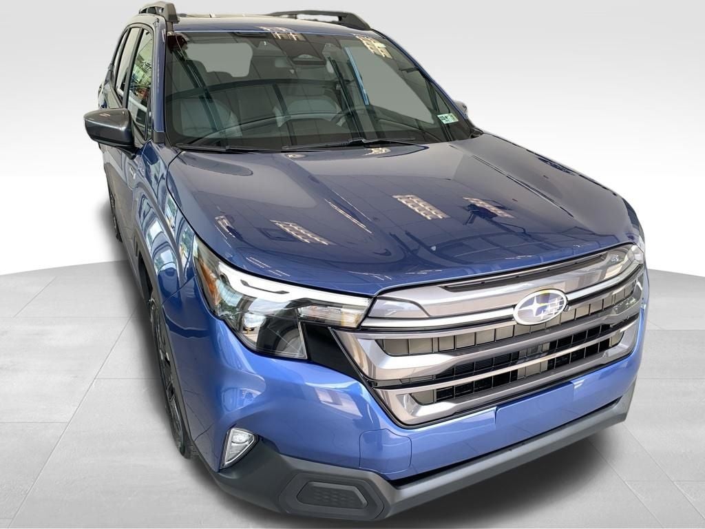 2026 Subaru FORESTER Premium Hybrid in Daybreak Blue Pearl — front three-quarter view