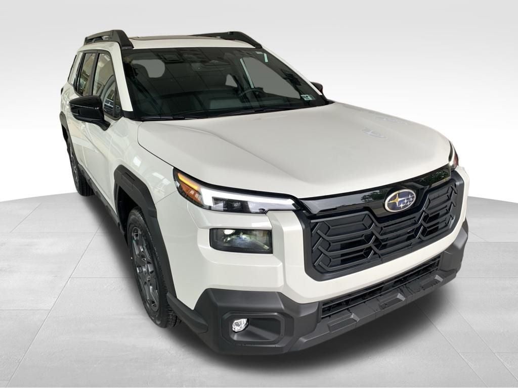 2026 Subaru OUTBACK Premium in Crystal White Pearl — front three-quarter view
