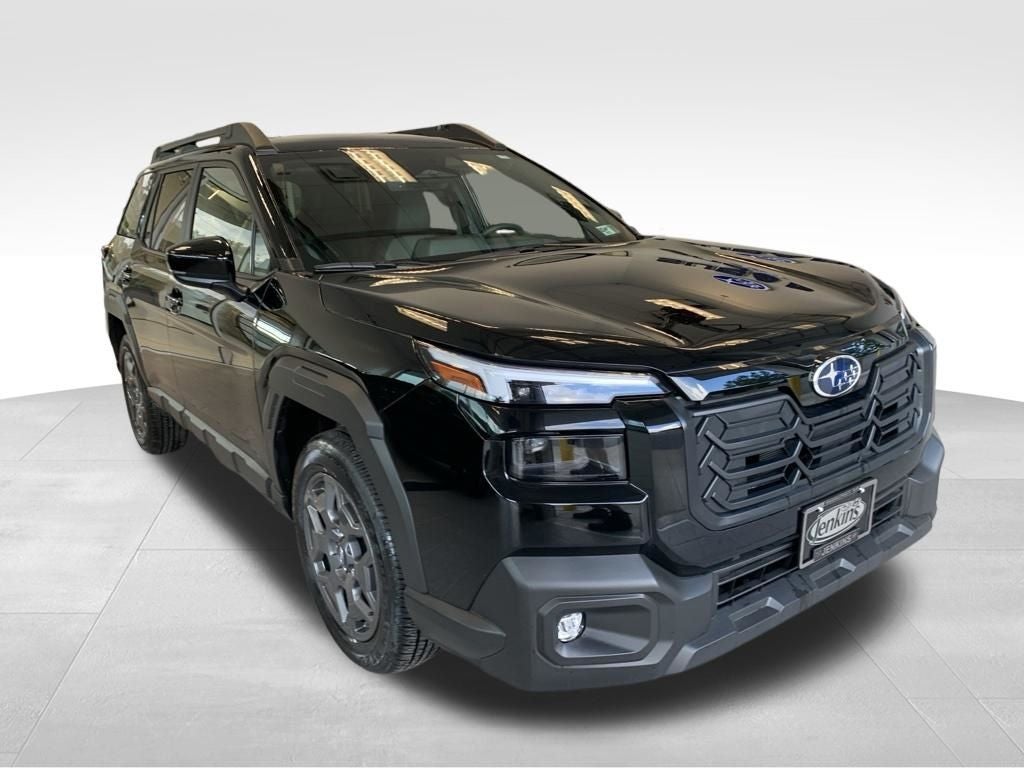 2026 Subaru OUTBACK Premium in Crystal Black Silica — front three-quarter view