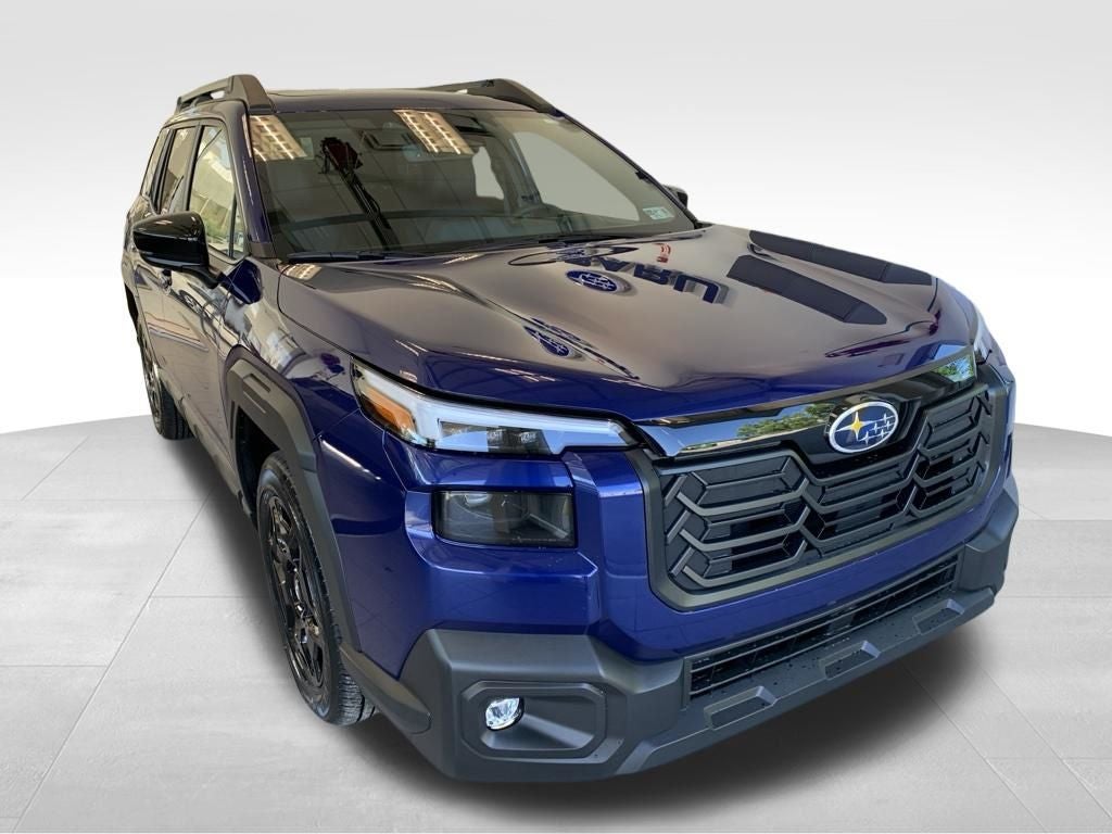 2026 Subaru OUTBACK Limited in Sapphire Blue Pearl — front three-quarter view