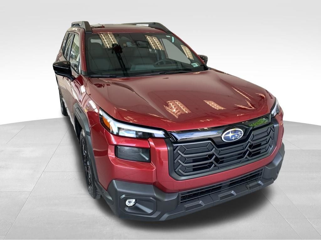 2026 Subaru OUTBACK Limited in Crimson Red Pearl — front three-quarter view