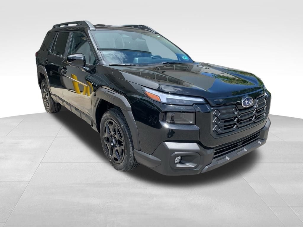 2026 Subaru OUTBACK Limited in Crystal Black Silica — front three-quarter view