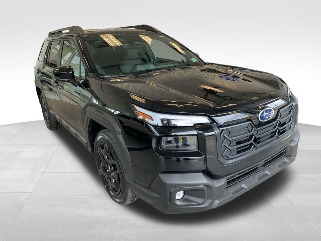 2026 Subaru OUTBACK Limited in Crystal Black Silica — front three-quarter view