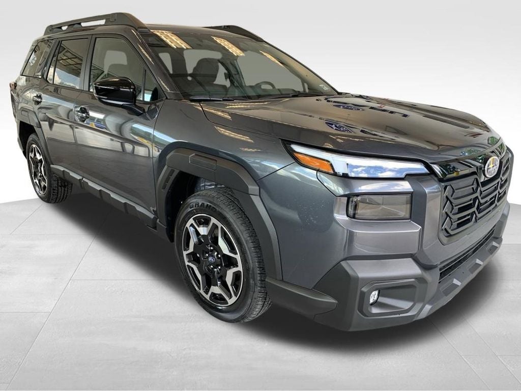 2026 Subaru OUTBACK Touring in Magnetite Gray Metallic — front three-quarter view