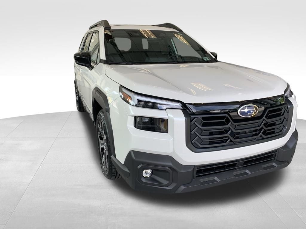 2026 Subaru OUTBACK Touring XT in Crystal White Pearl — front three-quarter view