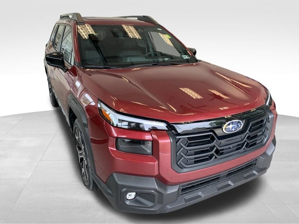 2026 Subaru OUTBACK Touring XT in Crimson Red Pearl — front three-quarter view