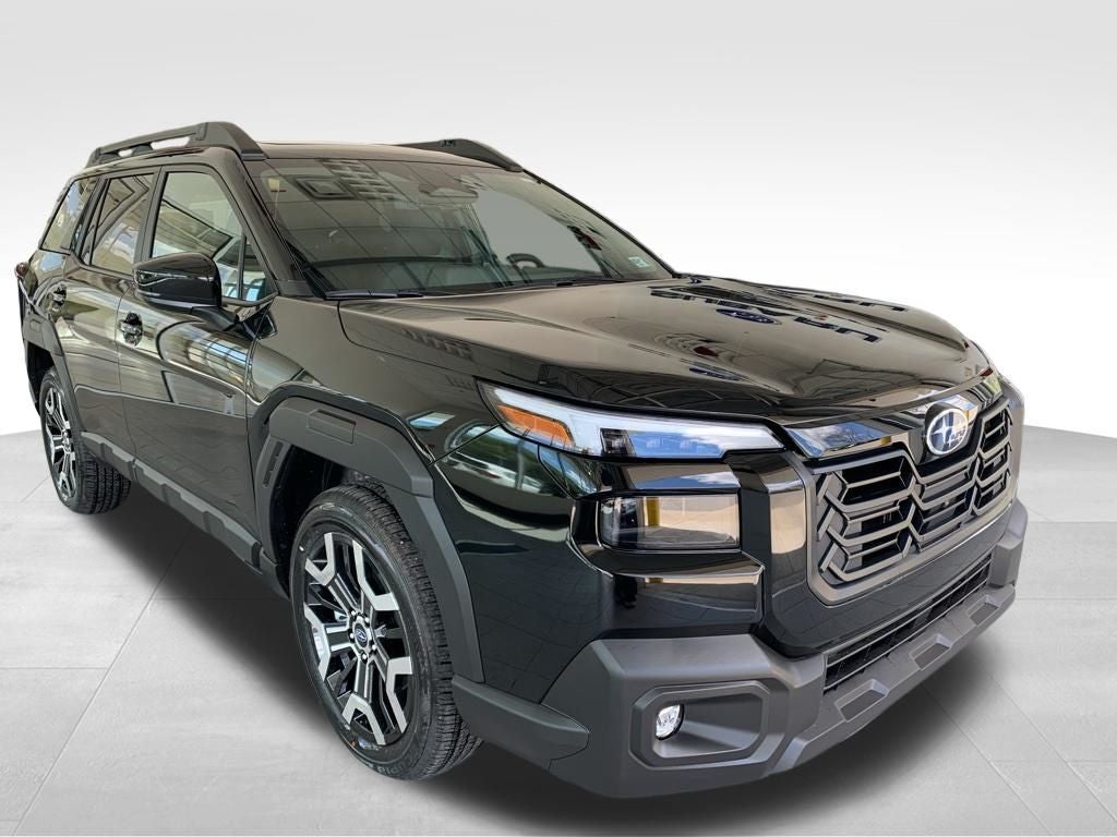 2026 Subaru OUTBACK Touring XT in Crystal Black Silica — front three-quarter view