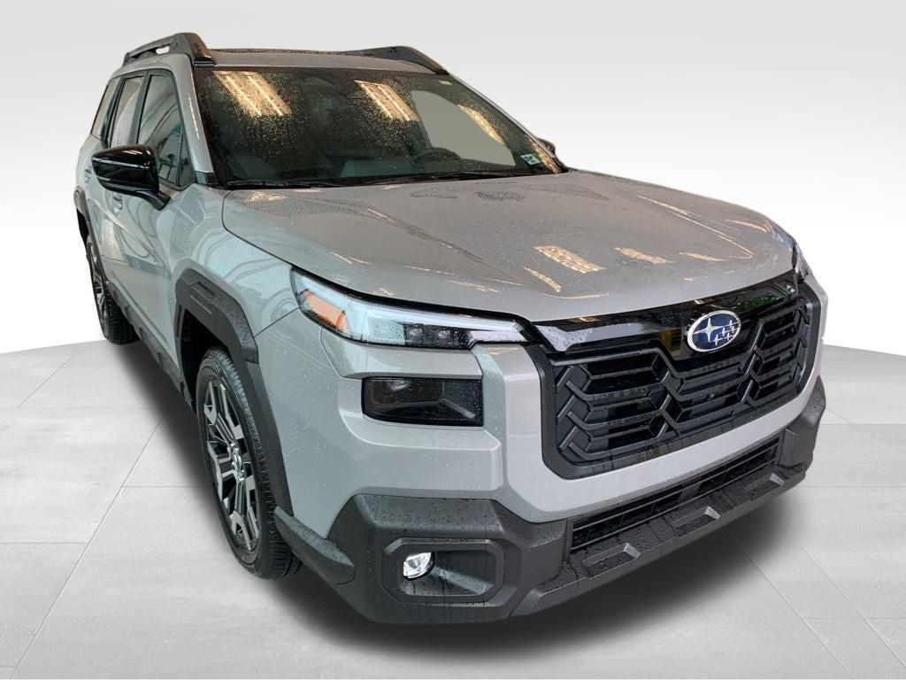 2026 Subaru OUTBACK Touring XT in River Rock Pearl — front three-quarter view