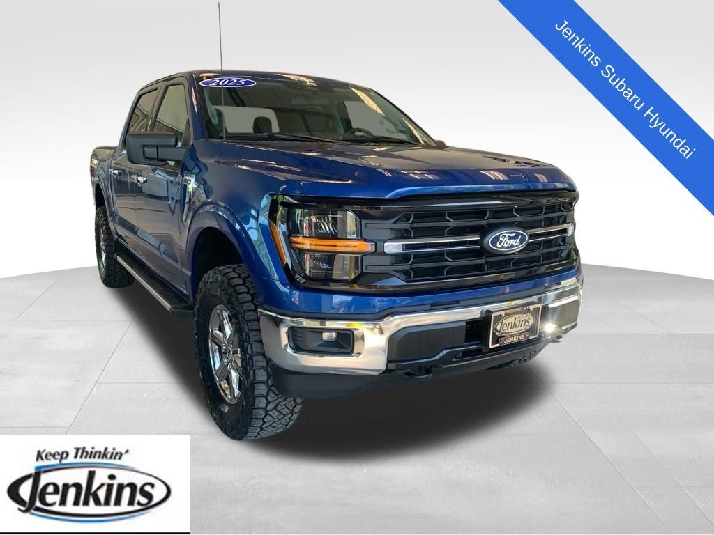 2025 Ford F-150 XLT in Atlas Blue Metallic — front three-quarter view