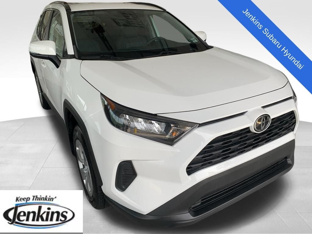 2021 Toyota RAV4 LE in Super White — front three-quarter view