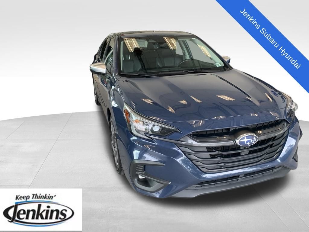 2023 Subaru Legacy Touring XT in Cosmic Blue Pearl — front three-quarter view