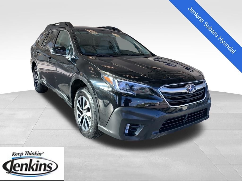 2020 Subaru Outback Premium in Crystal Black Silica — front three-quarter view