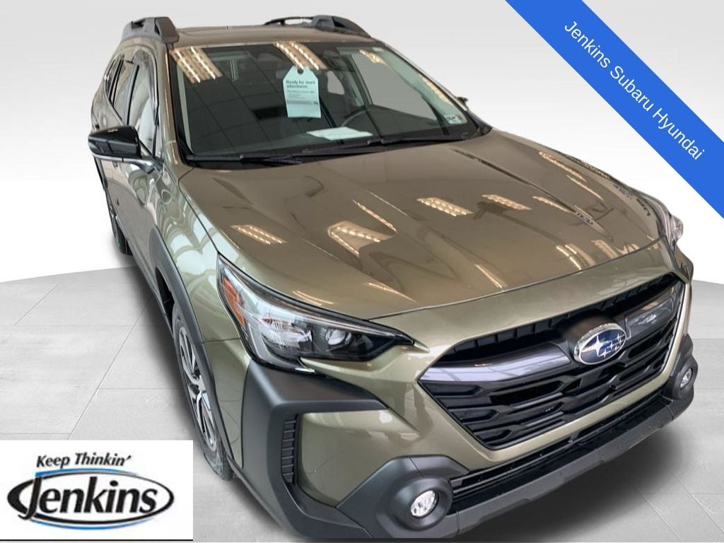2025 Subaru Outback Premium in Autumn Green Metallic — front three-quarter view