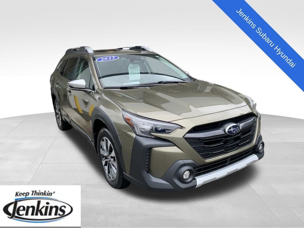 2023 Subaru Outback Touring XT in Autumn Green Metallic — front three-quarter view
