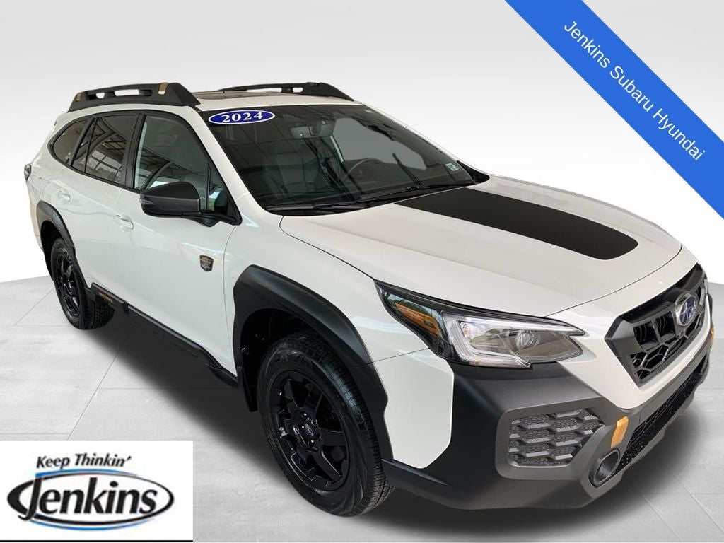 2024 Subaru Outback Wilderness in Crystal White Pearl — front three-quarter view