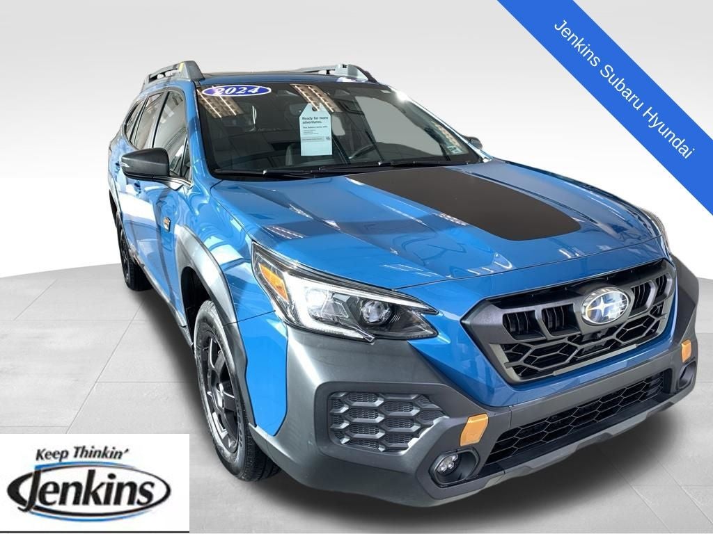 2024 Subaru Outback Wilderness in Geyser Blue — front three-quarter view