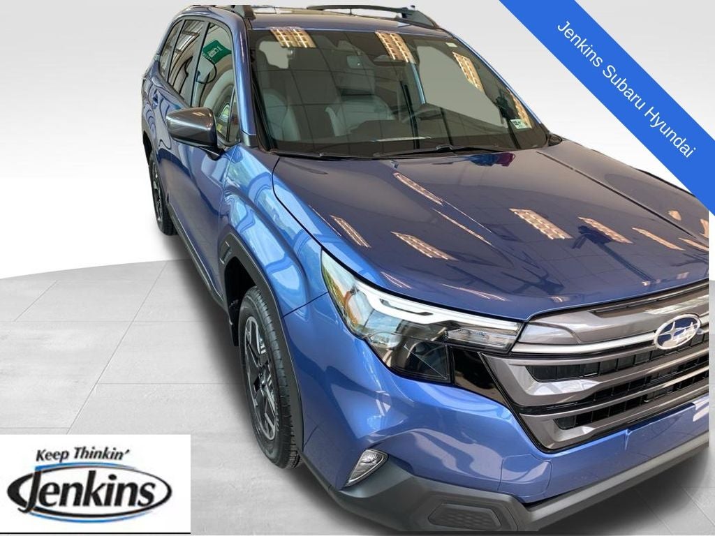 2026 Subaru Forester Premium in Daybreak Blue Pearl — front three-quarter view