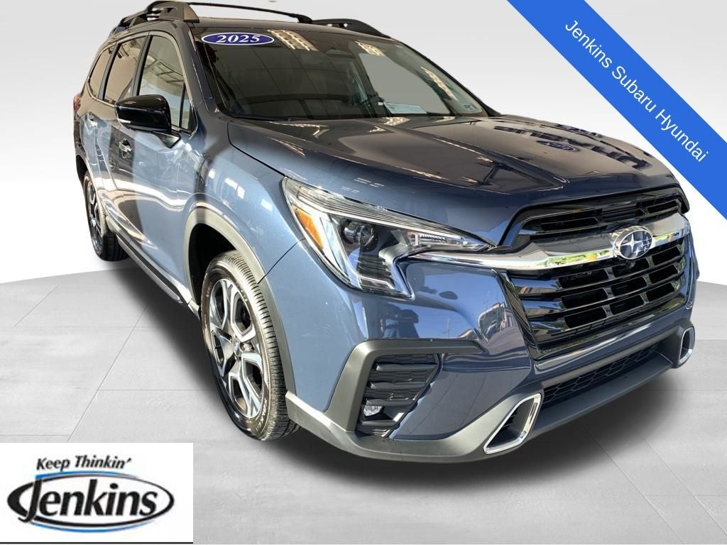 2025 Subaru Ascent Touring in Cosmic Blue — front three-quarter view