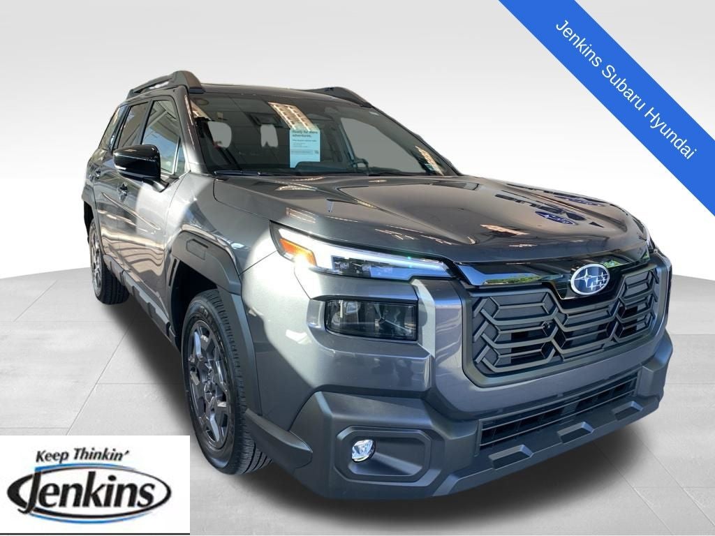 2026 Subaru Outback Premium in Magnetite Gray Metallic — front three-quarter view