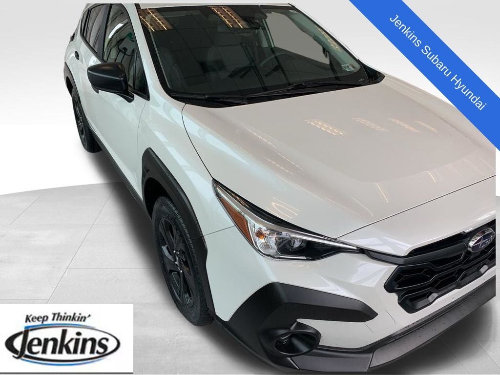 2025 Subaru Crosstrek Base in Crystal White Pearl — front three-quarter view